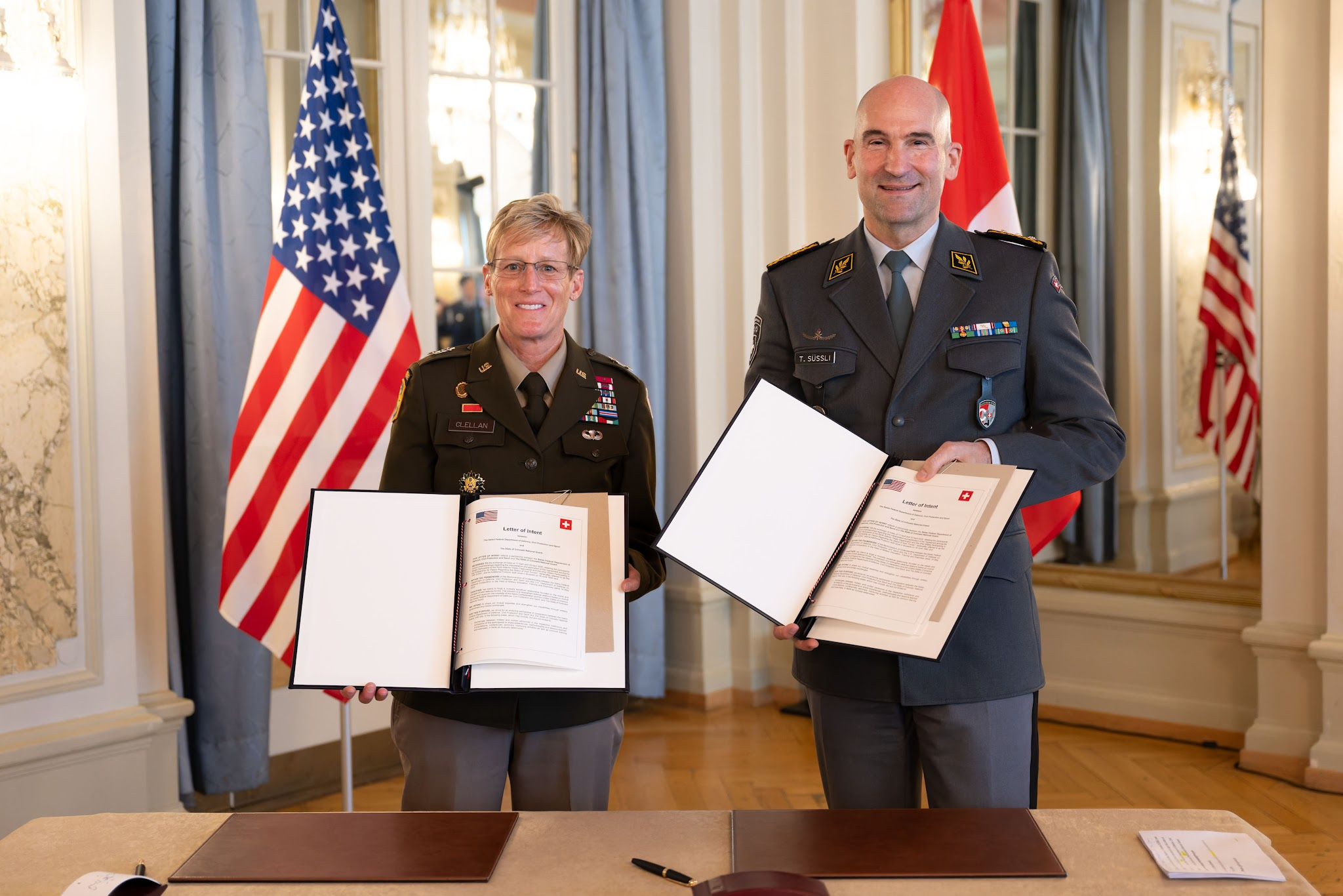 U.S. Army Maj. Gen. Laura Clellan, The Adjutant General of Colorado, and Lt. Gen. Thomas Süssli, chief of the Swiss Armed Forces, at the signing of the Letter of Intent for the new National Guard Bureau State Partnership Program partnership between Switzerland and Colorado. (Photo courtesy U.S. Embassy Bern)