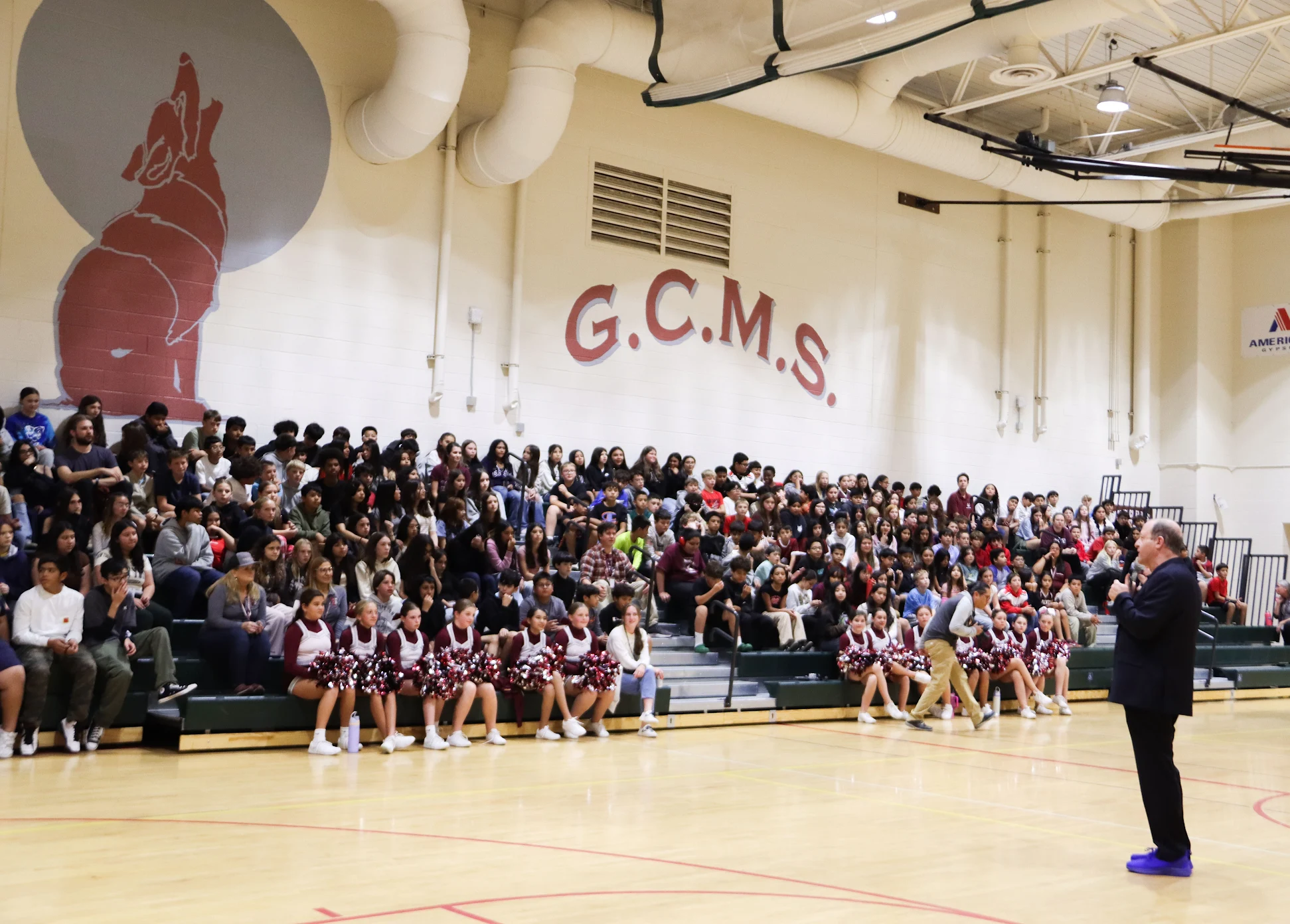 Governor Polis speaks to students at a pep rally at Gypsum Middle School 