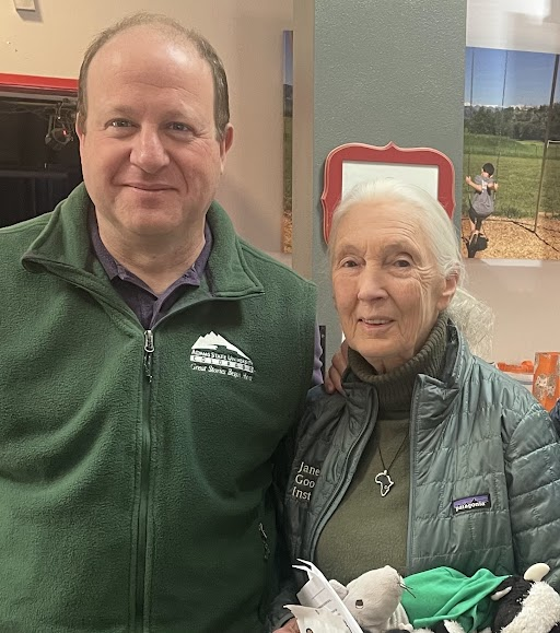 Governor Polis poses for a photo with Jane Goodall.